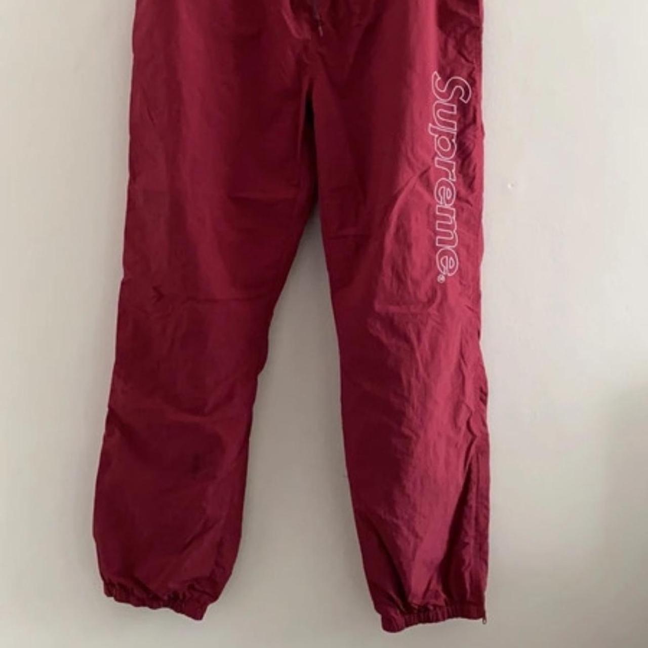 Supreme red hot sale track pants