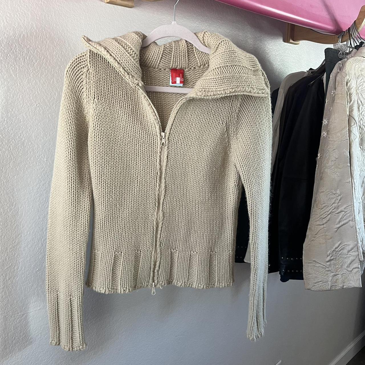 Tan knit sweater with double zip, dunno why it shows... - Depop