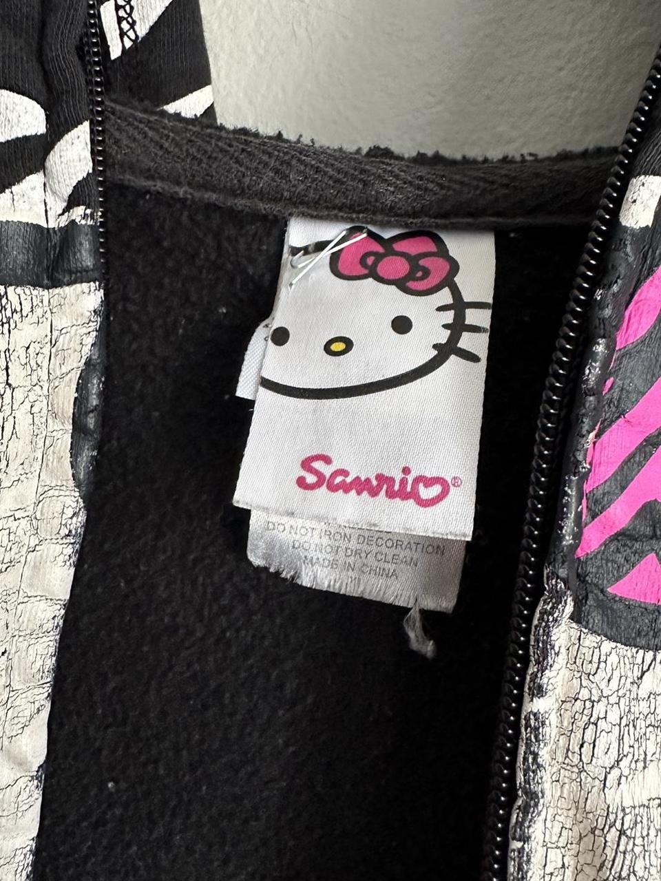 Hello kitty zebra zip up hoodie Size small Slight... - Depop