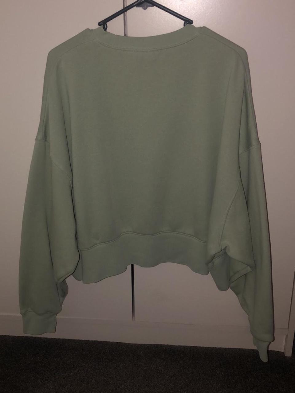 sage green nike shirt